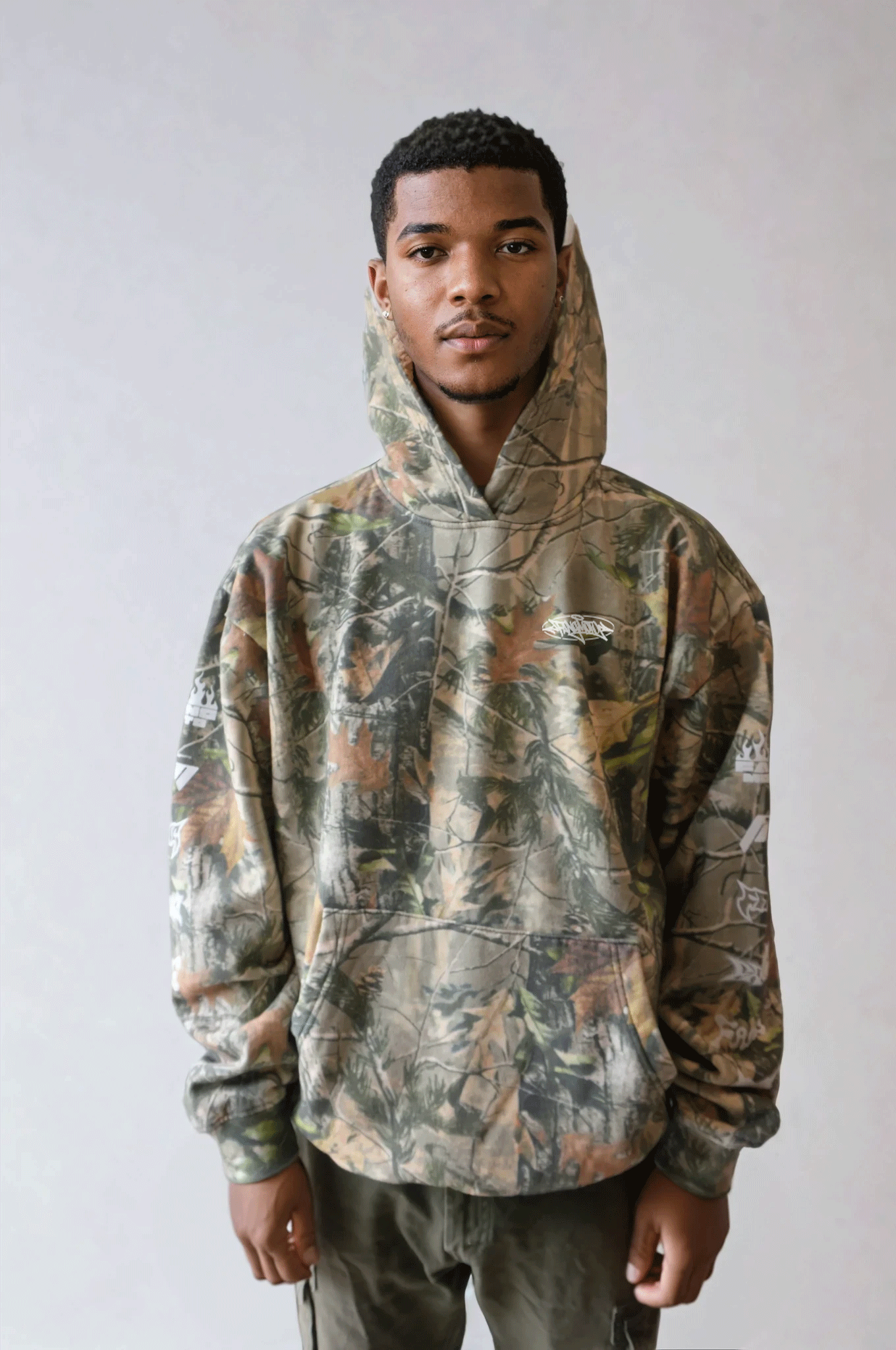 "Primo" in Woodland Camo Heavyweight Hoodie by FANGMOTO™